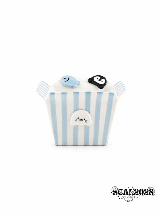 Seal and penguin fruit salad snack bowl